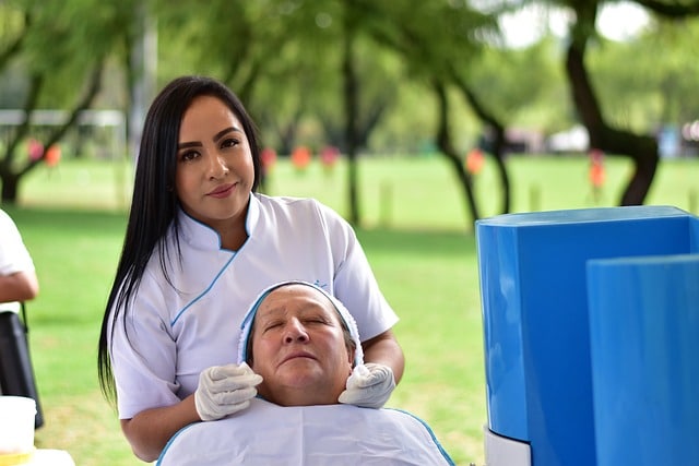 cosmetologist giving a facial